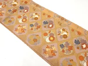 唐織花丸紋織出し袋帯